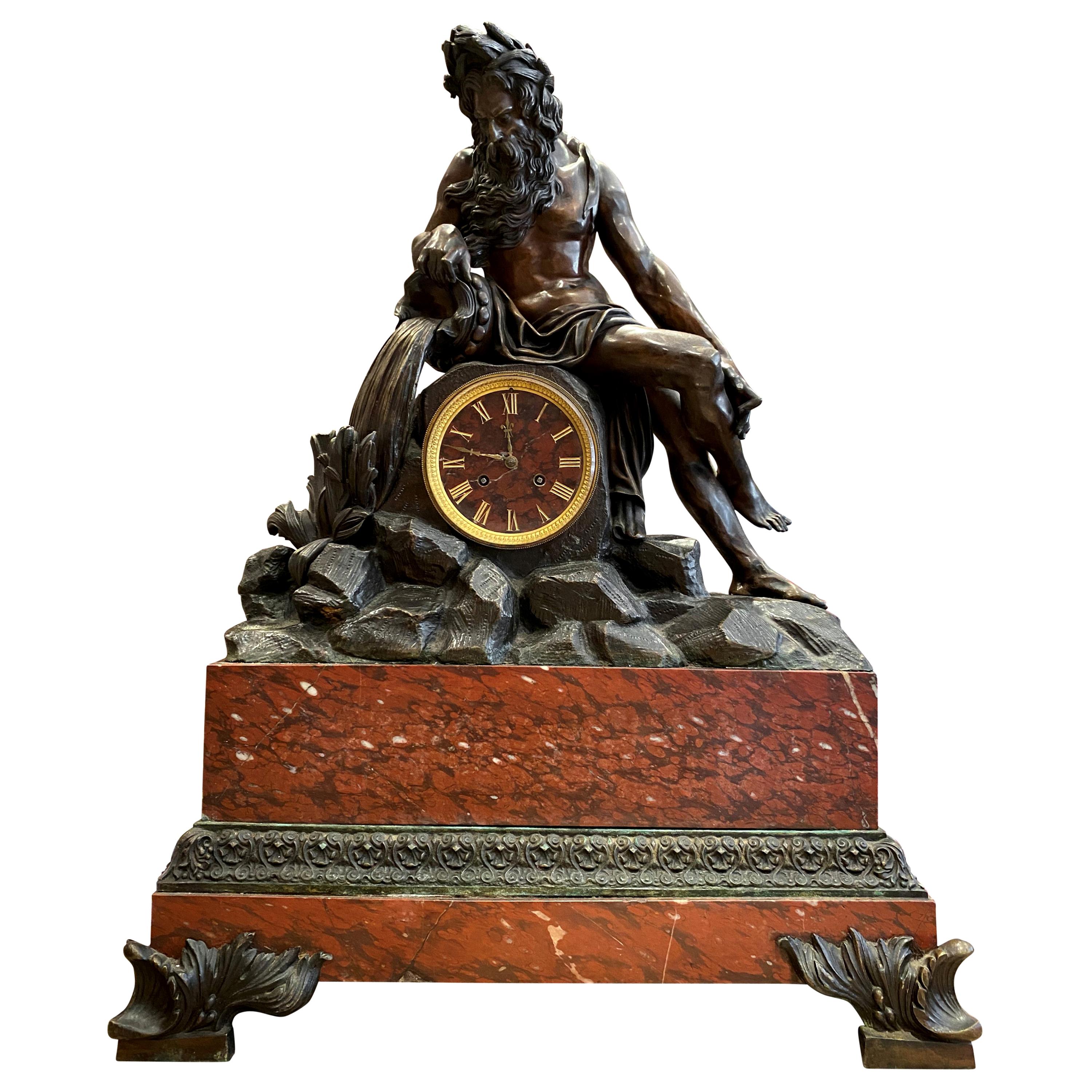 Grand French Gilt and Patinated Bronze Mantle Clock on a Marble Imperial Base For Sale