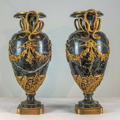 A Grand Ormolu-Mounted Verde Antico Marble Urns with Serpent Handles