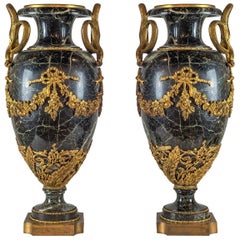 A Grand Ormolu-Mounted Verde Antico Marble Urns with Serpent Handles