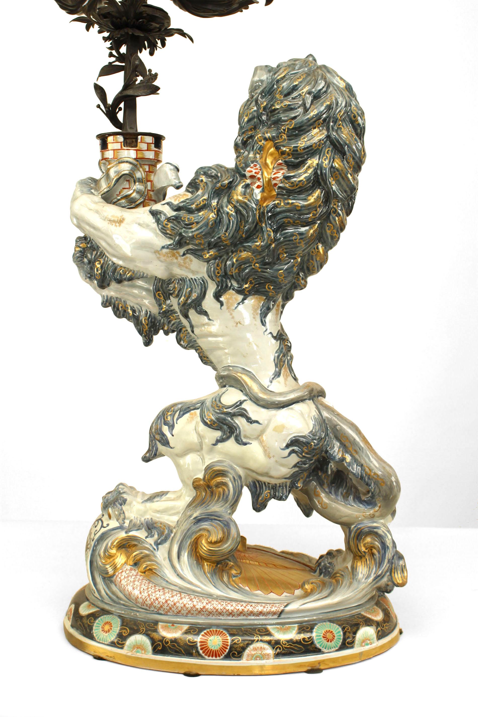 Pair of French Porcelain Lions Holding Wrought Iron Candelabras For Sale 5