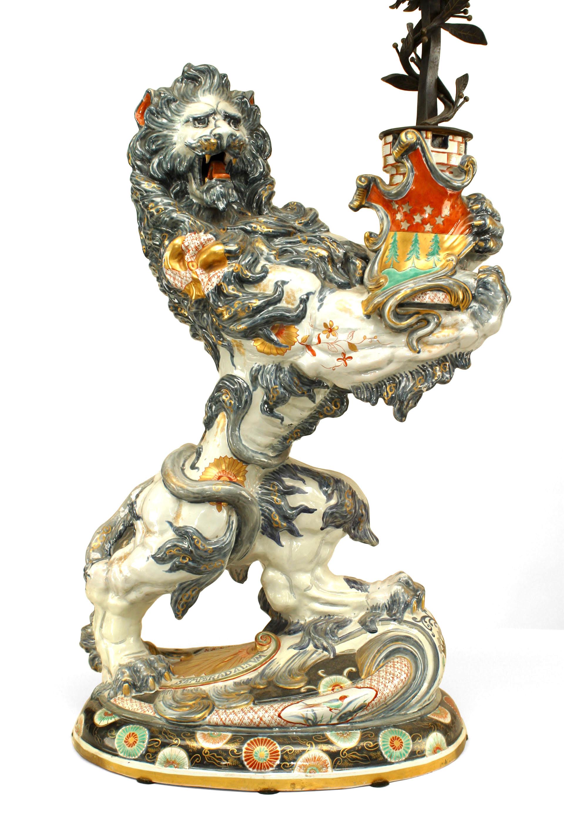 Napoleon III Pair of French Porcelain Lions Holding Wrought Iron Candelabras For Sale