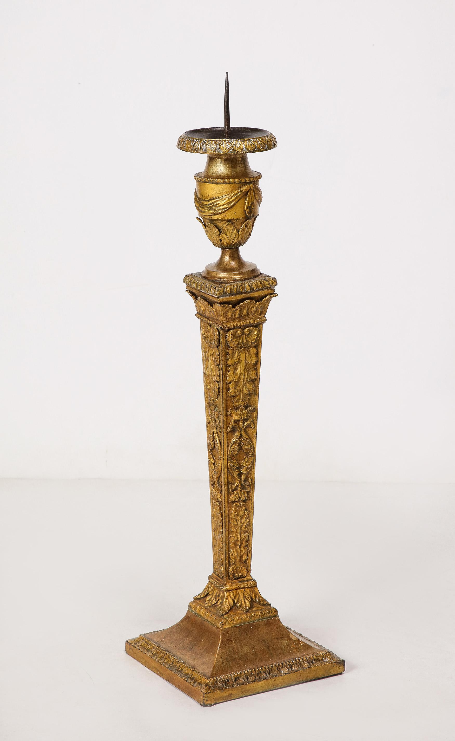 Empire Revival A Grand Pair of Empire Style Gilt Iron Candlesticks For Sale