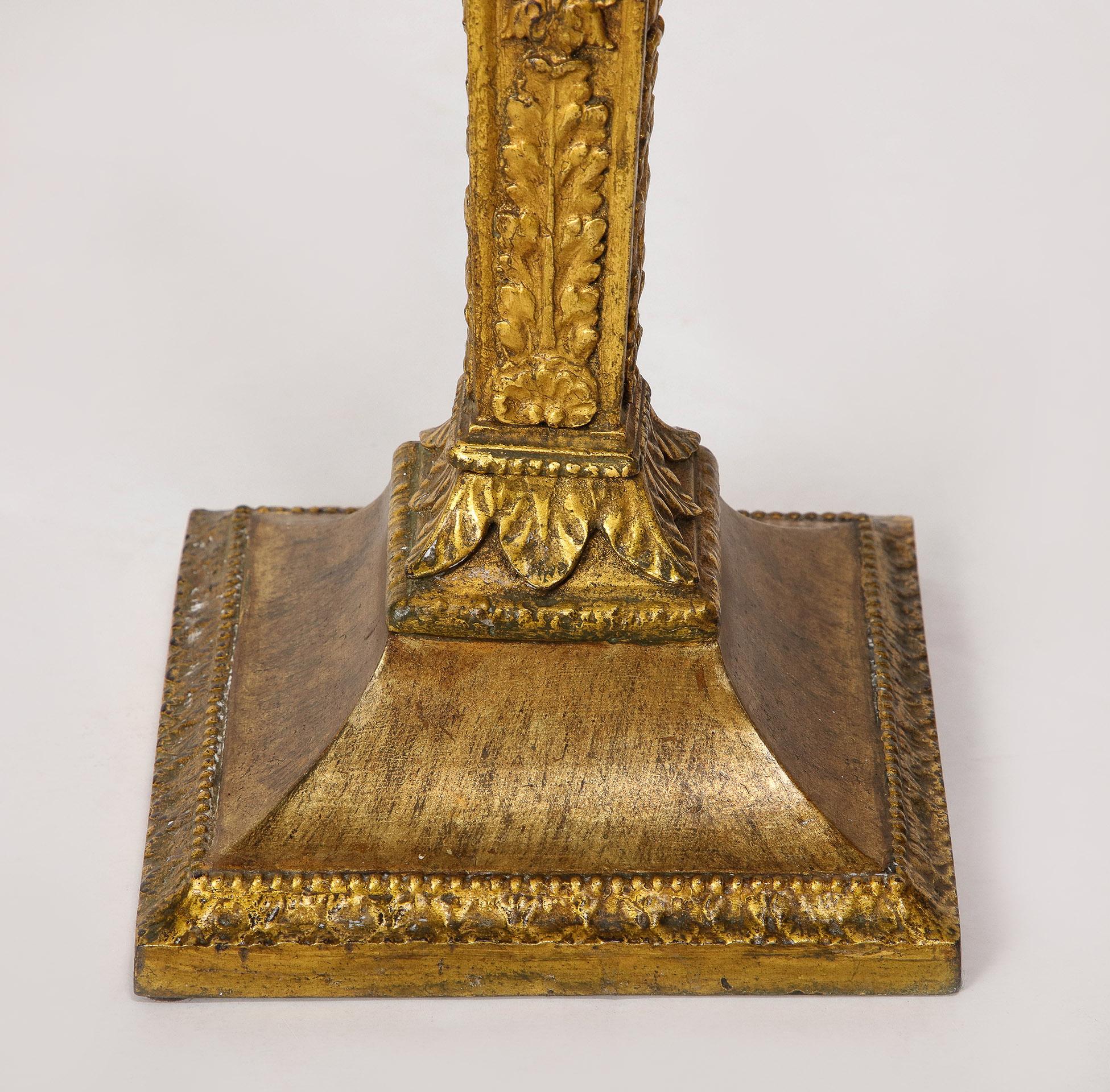 A Grand Pair of Empire Style Gilt Iron Candlesticks In Good Condition For Sale In New York, NY