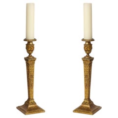 Großes Paar vergoldeter Eisen-Kerzenständer im Empire-Stil