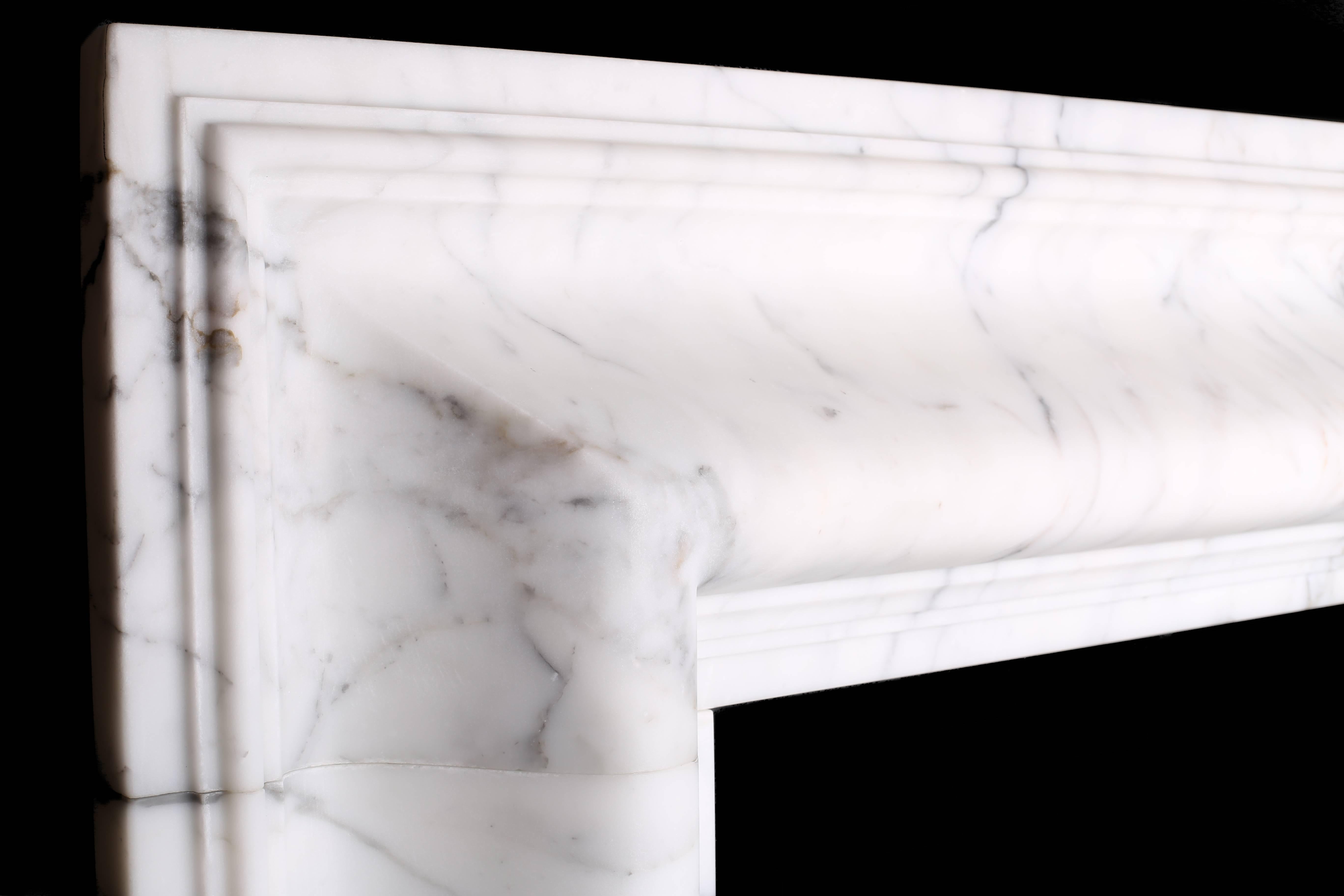 A grand Queen Anne style bolection fireplace in Italian statuary marble

Depth: 5