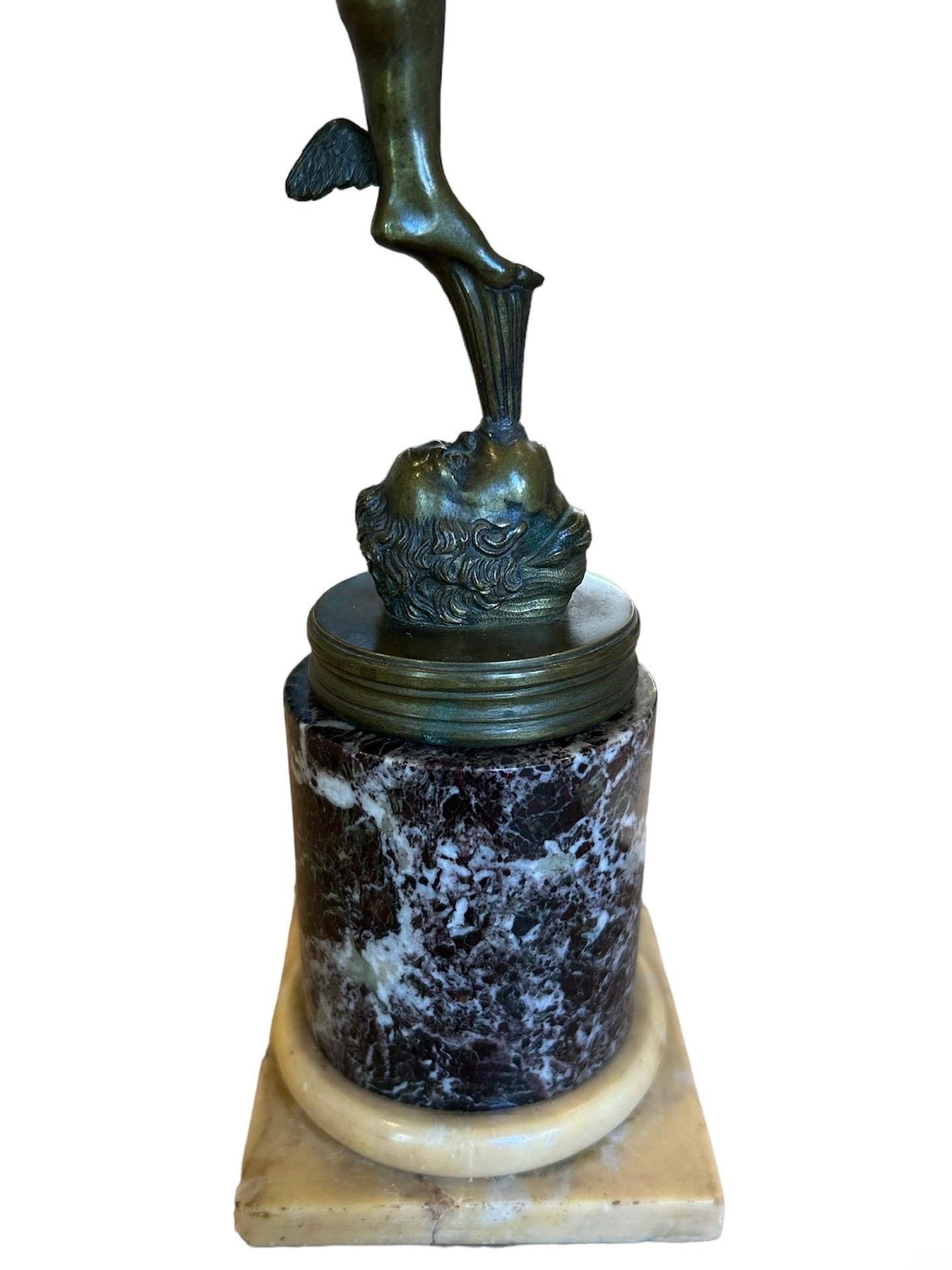 Mid-19th Century A grand tour bronze figure of Mercury ( Hermes ) on a marble collum For Sale