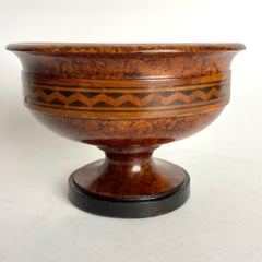 A Grand Tour grained beech pedestal bowl from the 19th Century