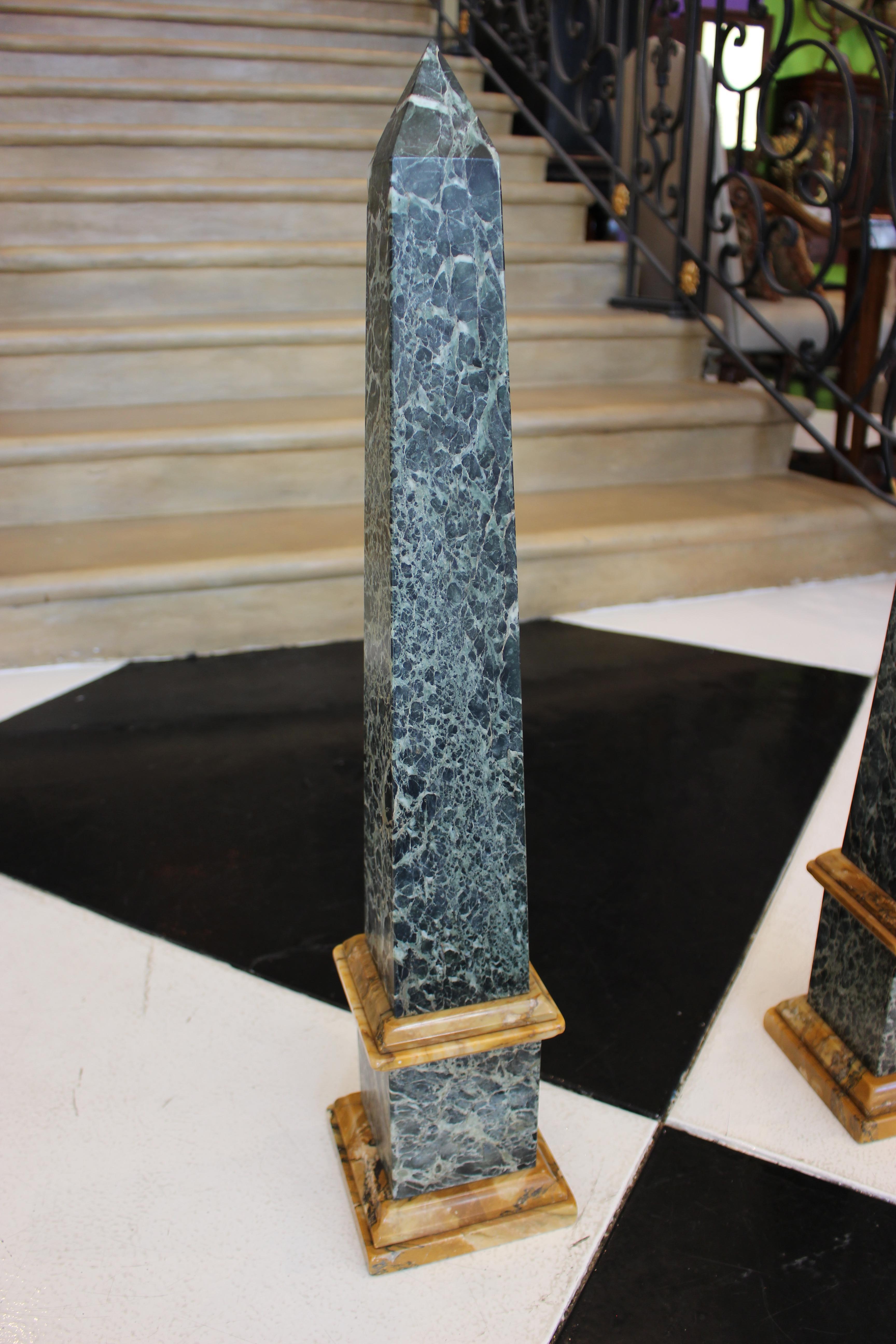 A Grand Tour pair of green and sienna marble obelisks, circa 1800.