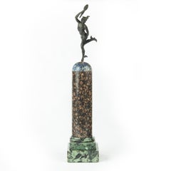 A Grand Tour Regency bronze figure of Mercury (Hermes) on a marble column
