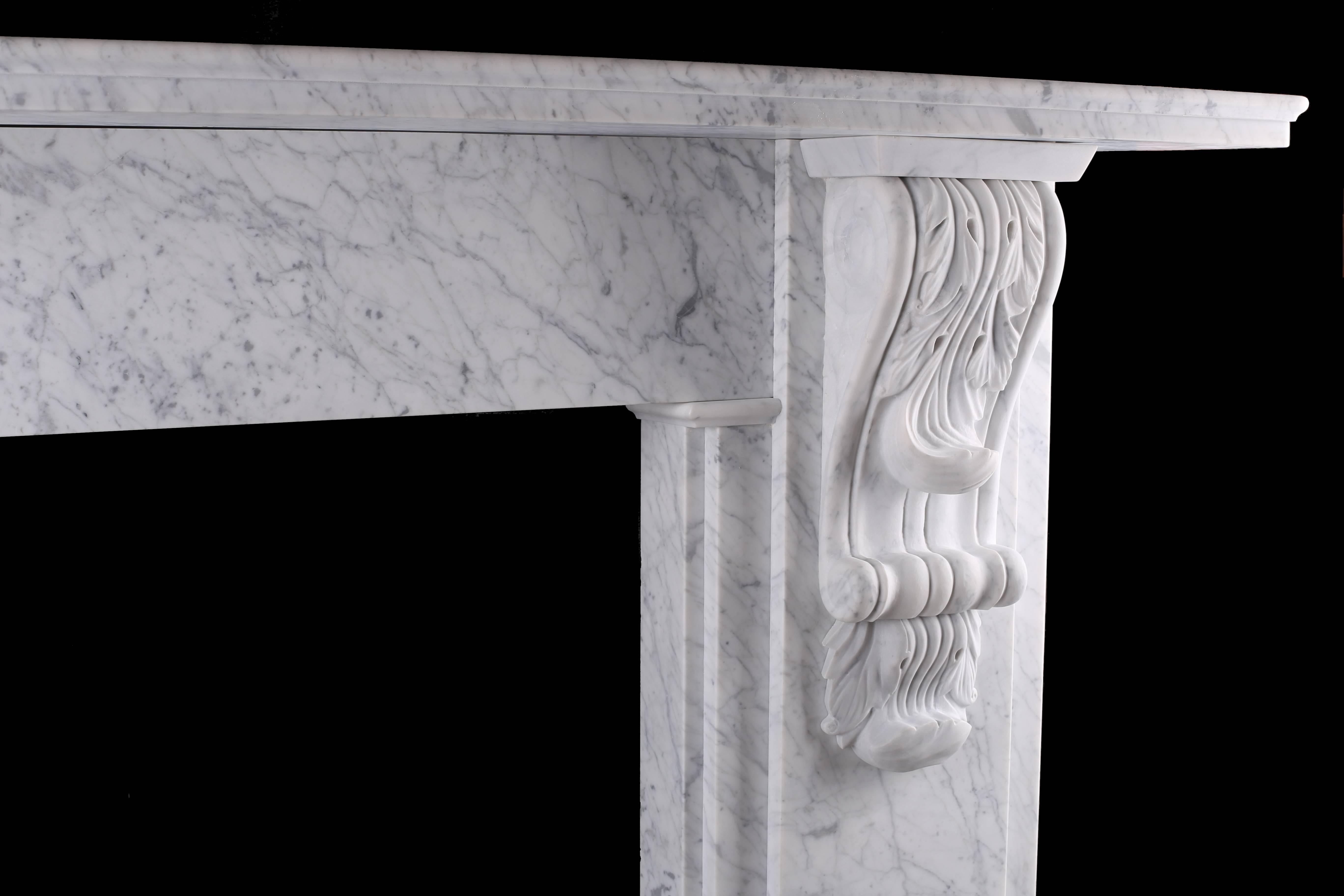 A grand Victorian carved corbel fireplace in Italian Carrara marble

Depth: 10