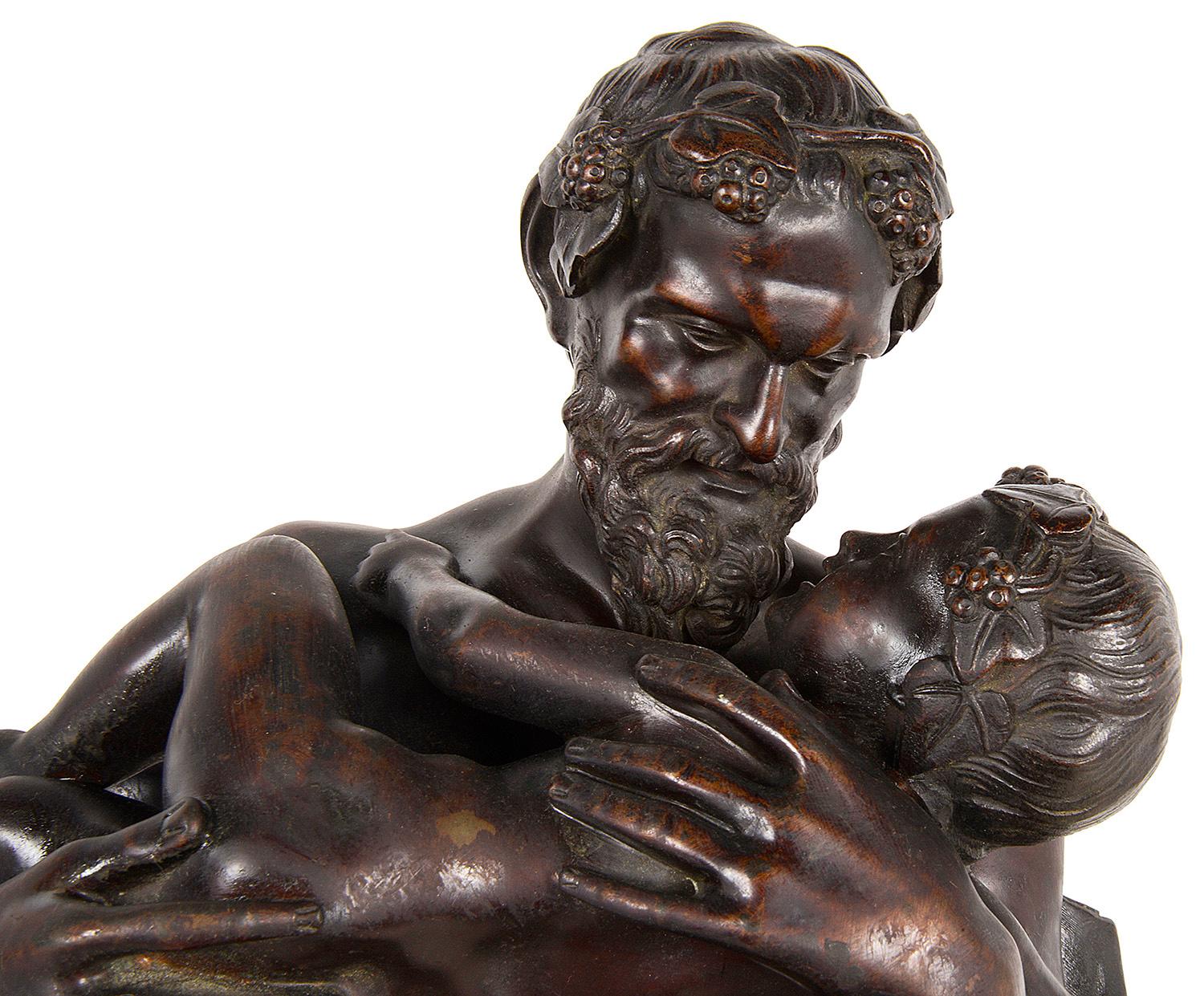 Patinated Grant Tour 19th Century Bronze Statue of Silenus Cradling the Infant Dionysus For Sale