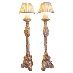 A great pair of 19th c Italian carved and gilt torchiere floor lamps
