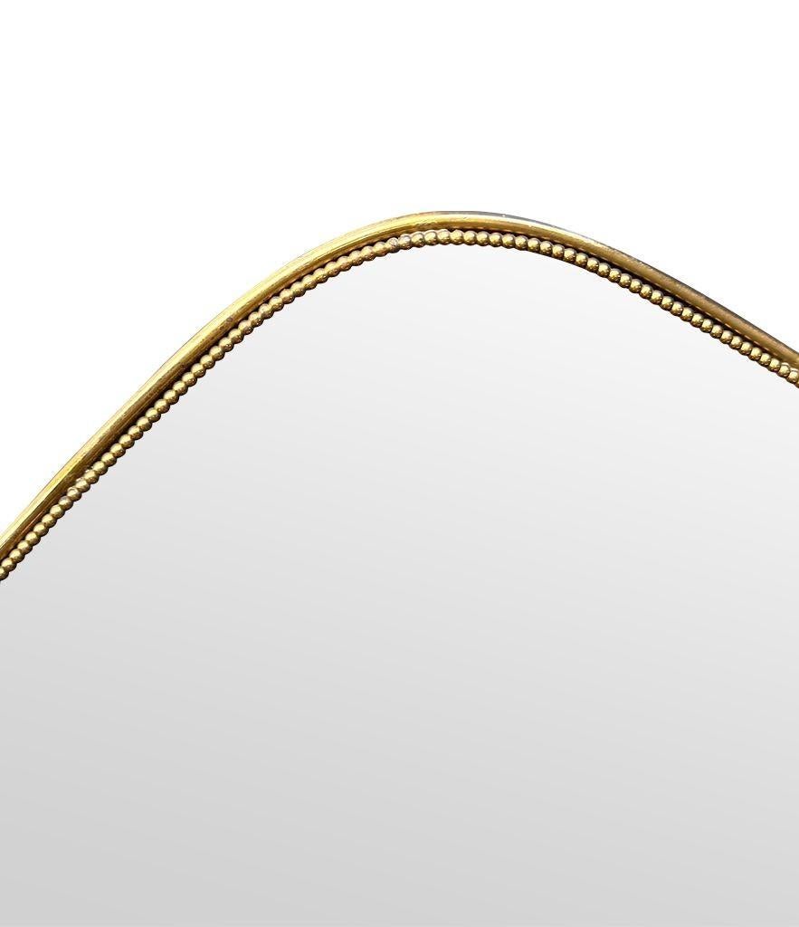 A great shaped orignal Italian 1950s shield mirror with brass beaded frame 2