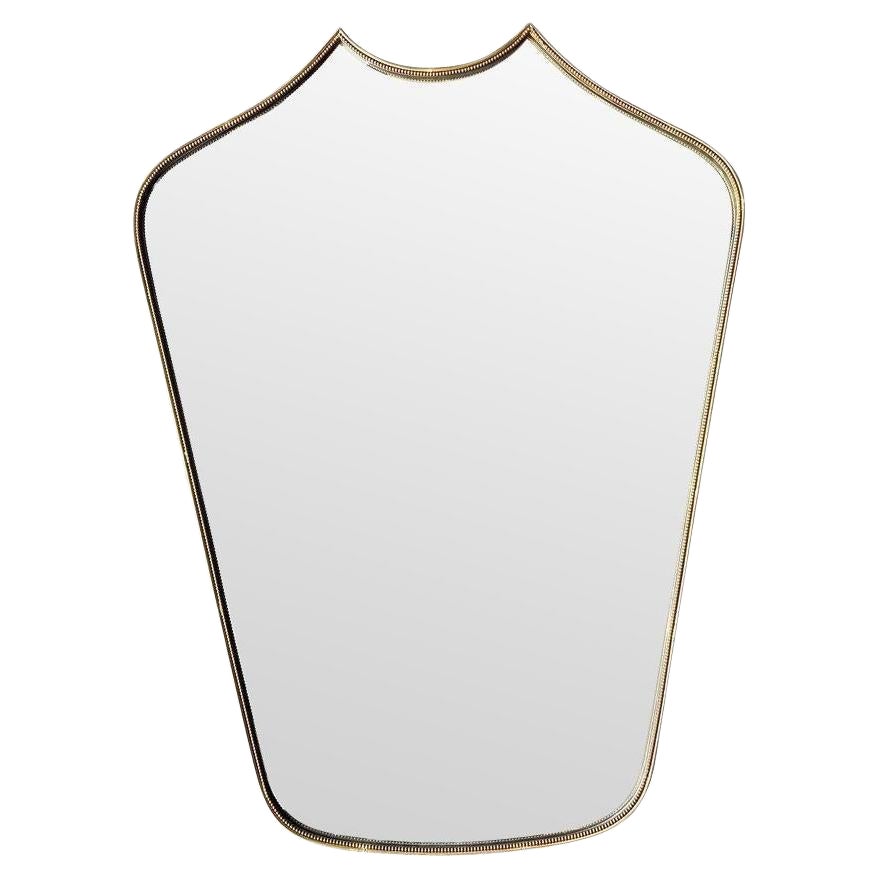 A great shaped orignal Italian 1950s shield mirror with brass beaded frame