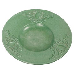 A green ceramic Art Deco plate by Michael Andersen, Denmark, 1940s