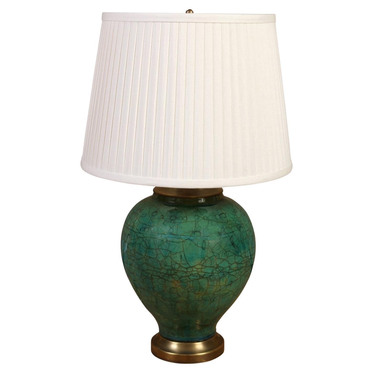 A Green Ceramic Lamp on a Brass Base For Sale