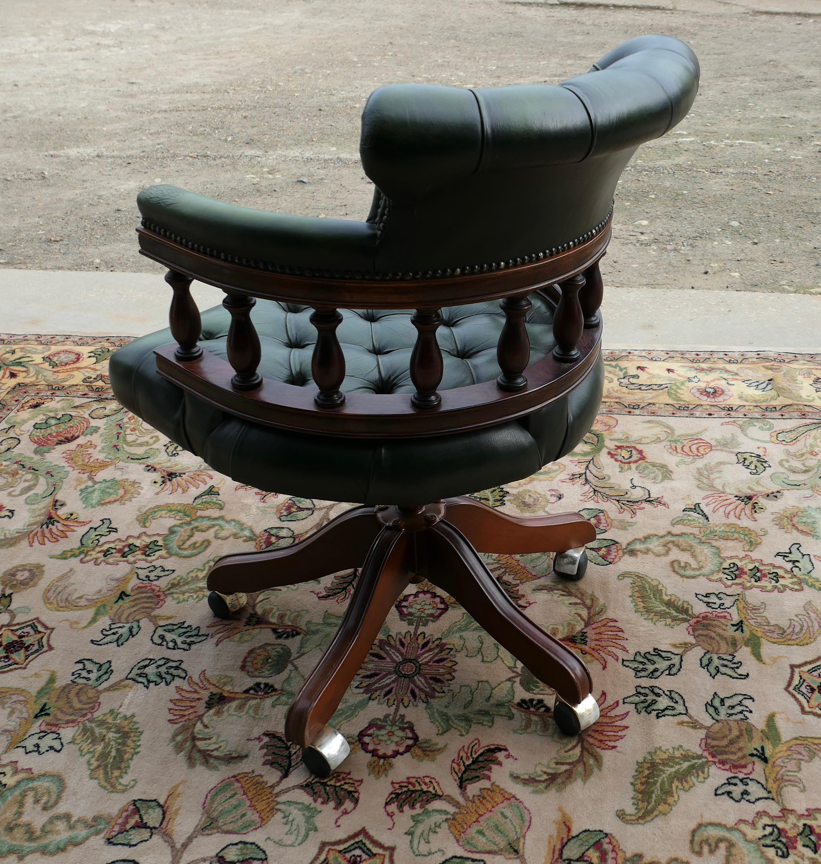 Late 20th Century A Green Leather Swivelling Desk Chair or Captains Chair