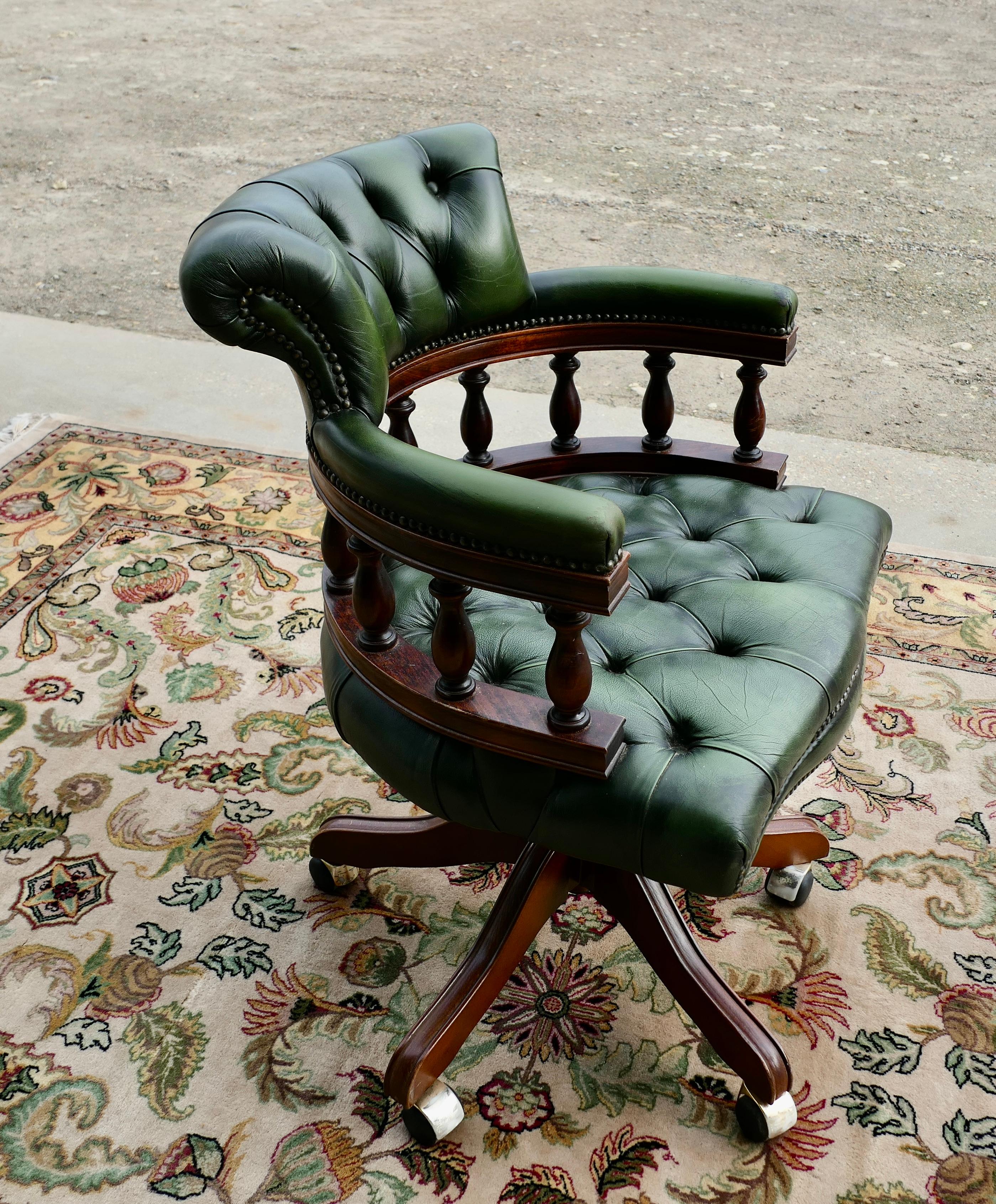 A Green Leather Swivelling Desk Chair or Captains Chair 1