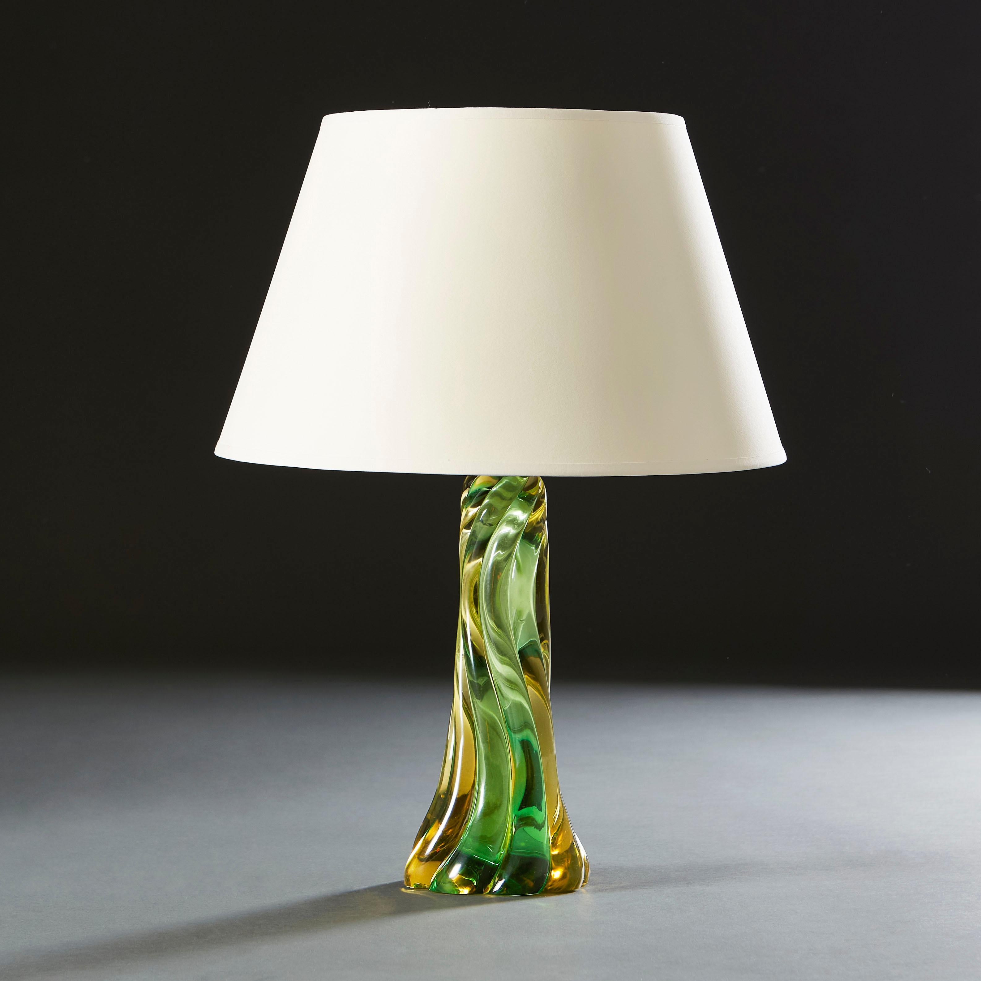 A Murano glass lamp with twisted stem in green and yellow glass.

Currently wired for the UK. 

Please note: Lampshade not included.