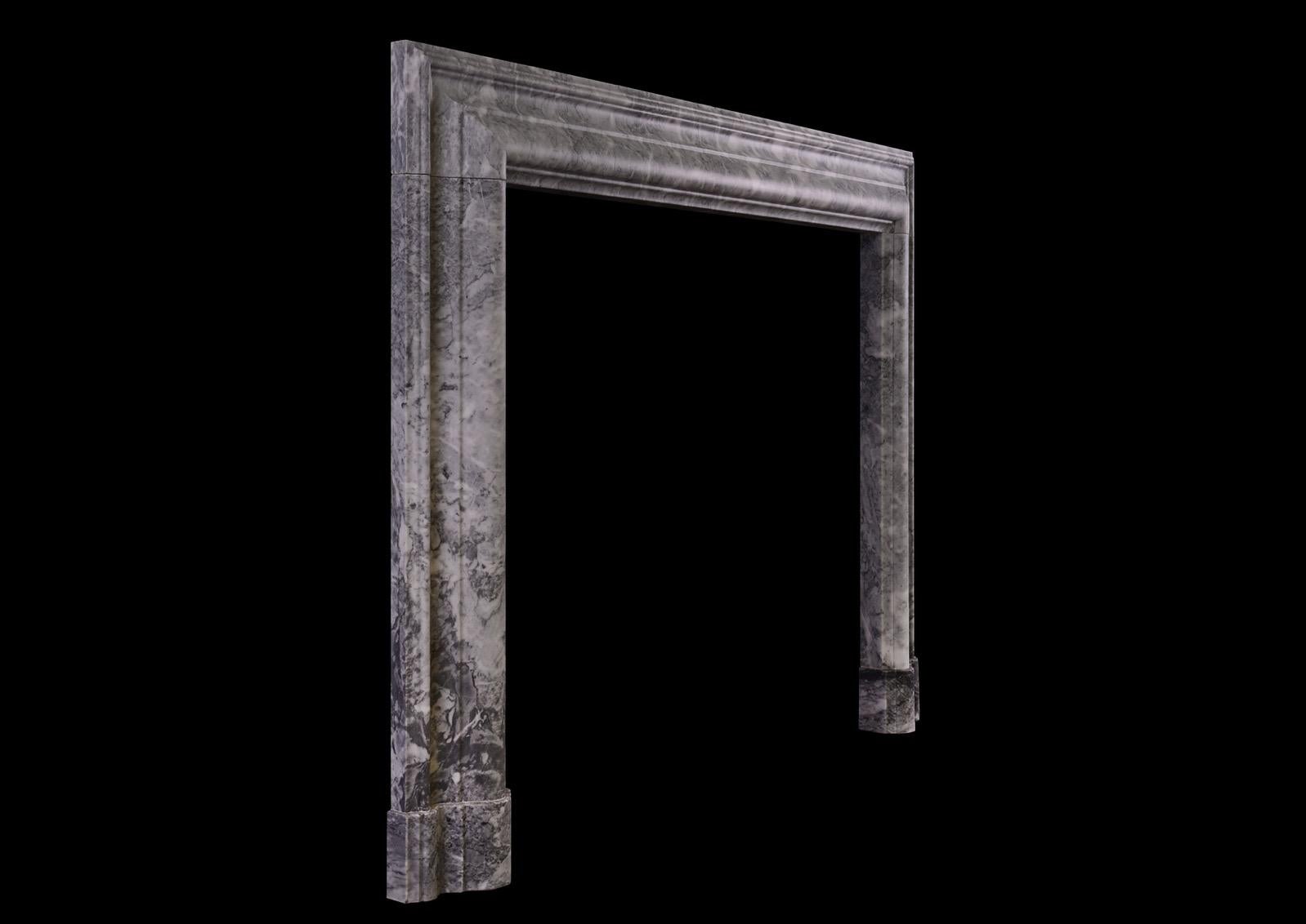 English A Grey and White Marble Bolection Fireplace For Sale