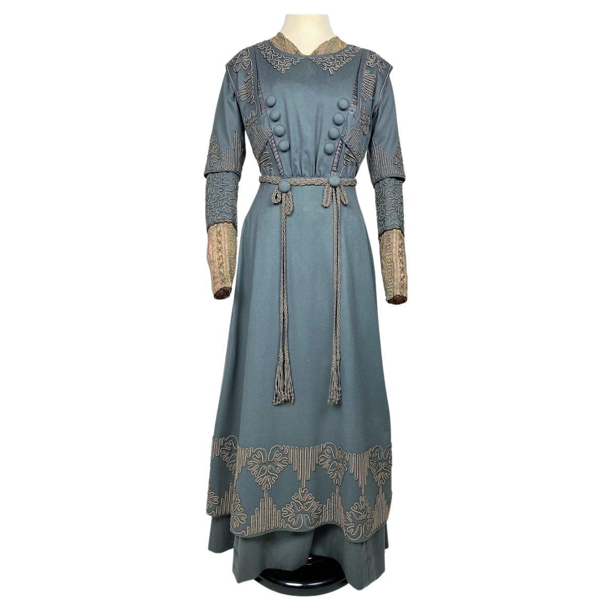 A Grey Wool Afternoon Gown with Appliqué trimmings and Lace Circa 1905-1910 For Sale