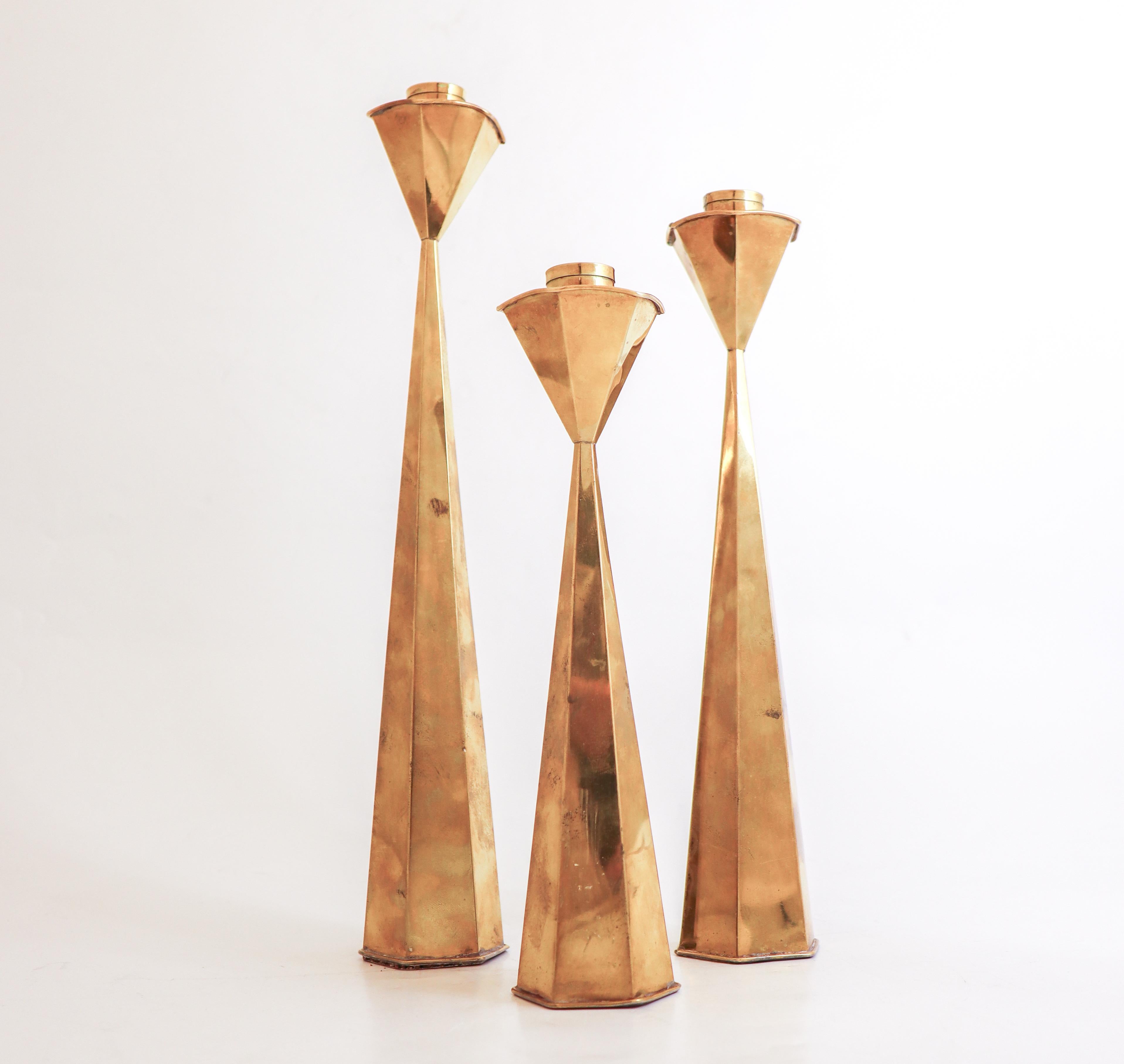 Scandinavian Modern A group of 3 Candlesticks Brass - Sweden Mid century For Sale