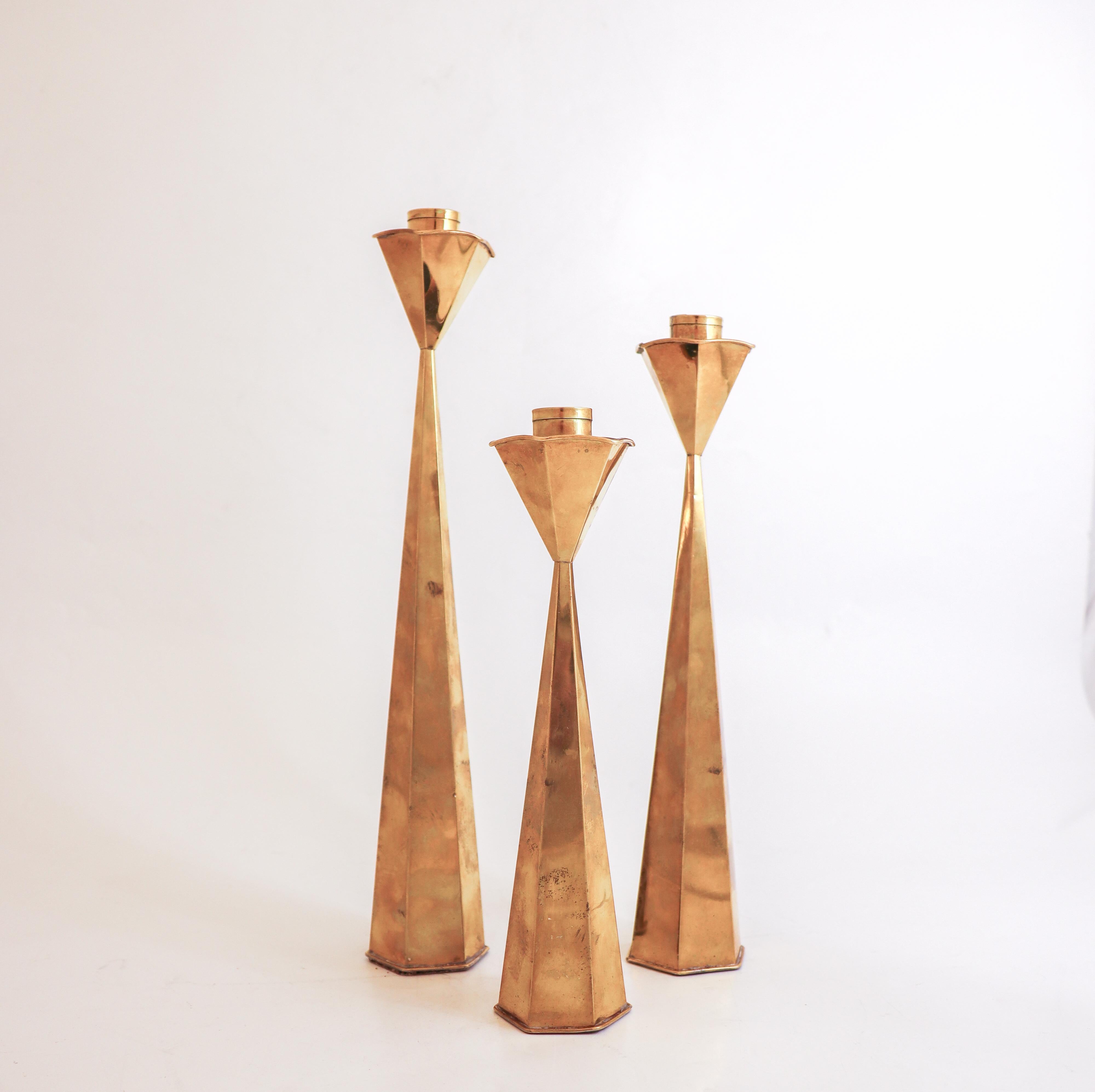 Mid-20th Century A group of 3 Candlesticks Brass - Sweden Mid century For Sale