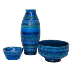 A Group of Aldo Londi for Bitossi Rimini Blue Glazed Ceramic Vase and Bowls A Group of Aldo Londi for Bitossi Rimini Blue Glazed Ceramic Vase and Bowls