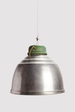 A group of big swinging aluminum industrial lamps, Italy 1920.