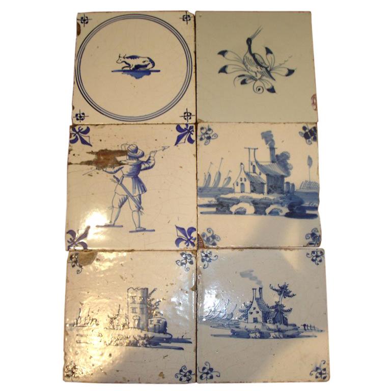 A Group of Dutch Blue and White Delft Tiles For Sale