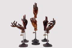 A group of five life-size wooden articulated hands for mannequins. Italy, 1900.