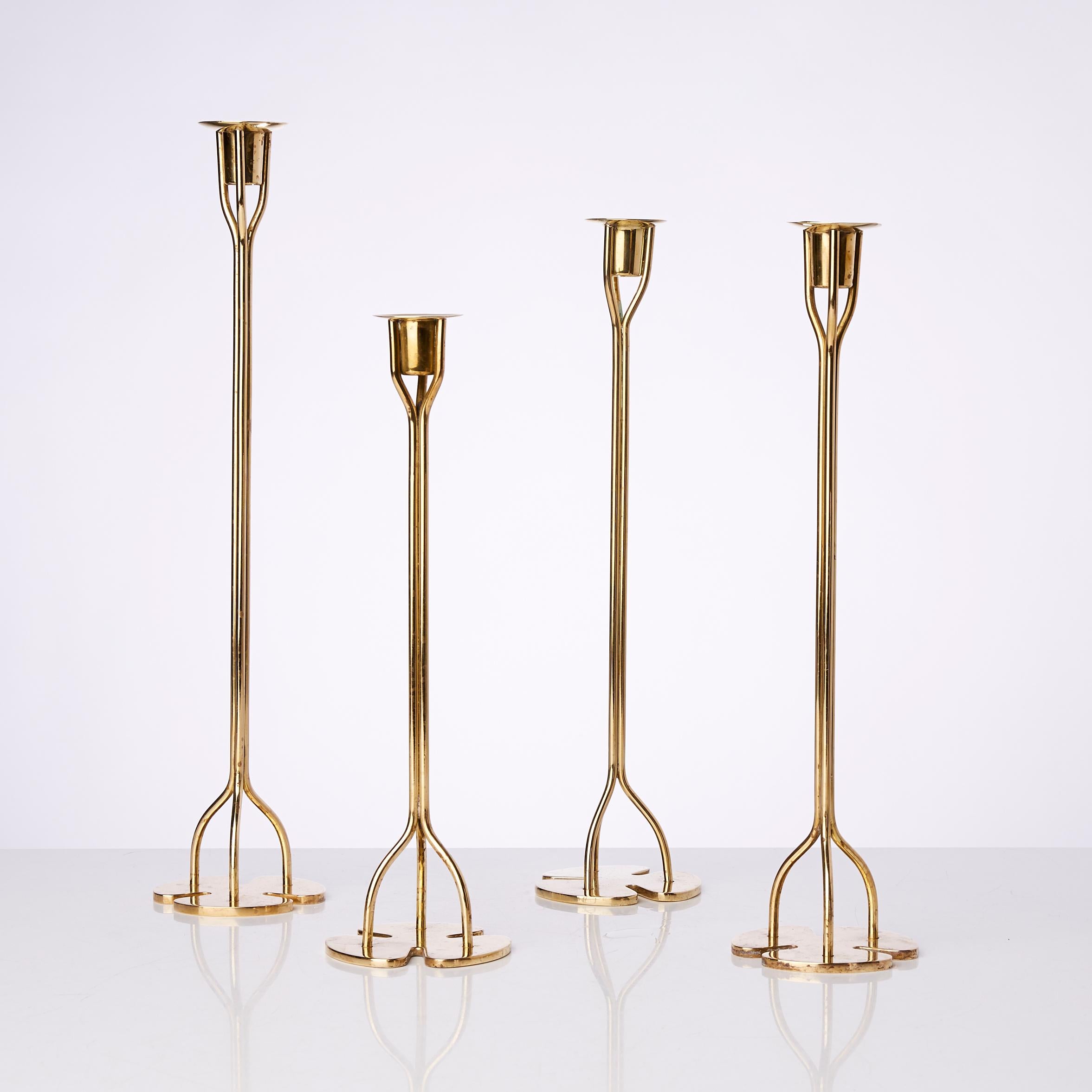 Set of four candleholders, of various heights, each made of three elongated stems.
Designed by Austrian-Swedish architect and designer Josef Frank in the 1940s for Svenskt Tenn, Stockholm.
These candlesticks are early examples of how nature and