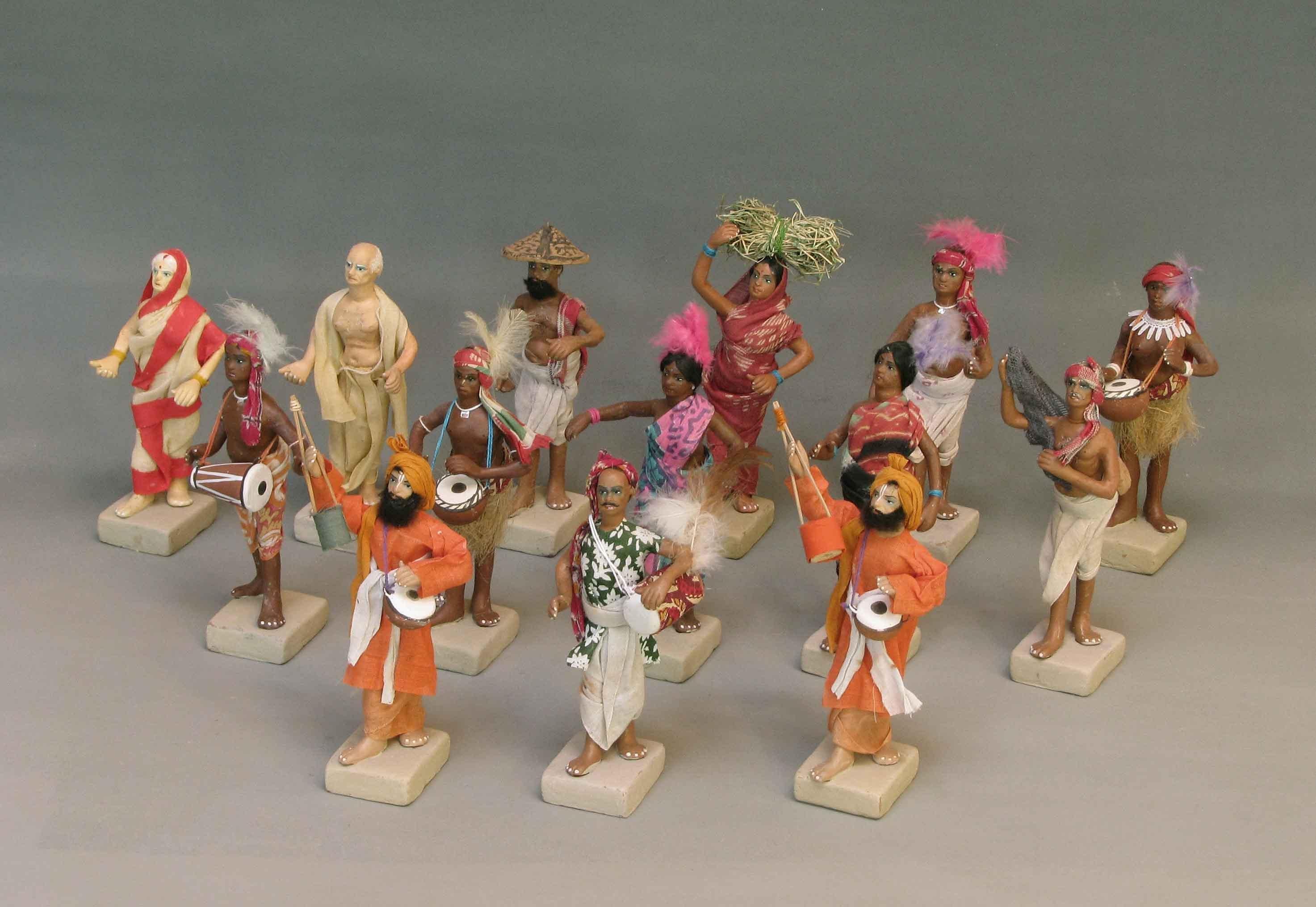 Group of Fourteen Indian Painted Terracotta & Cotton Dressed Figures For Sale 5