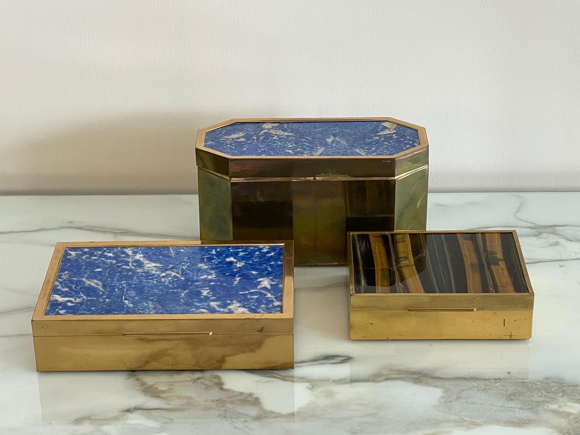 An elegant group of Italian boxes ca' 1970's. Brass, lapis lazuli and tiger's eye.