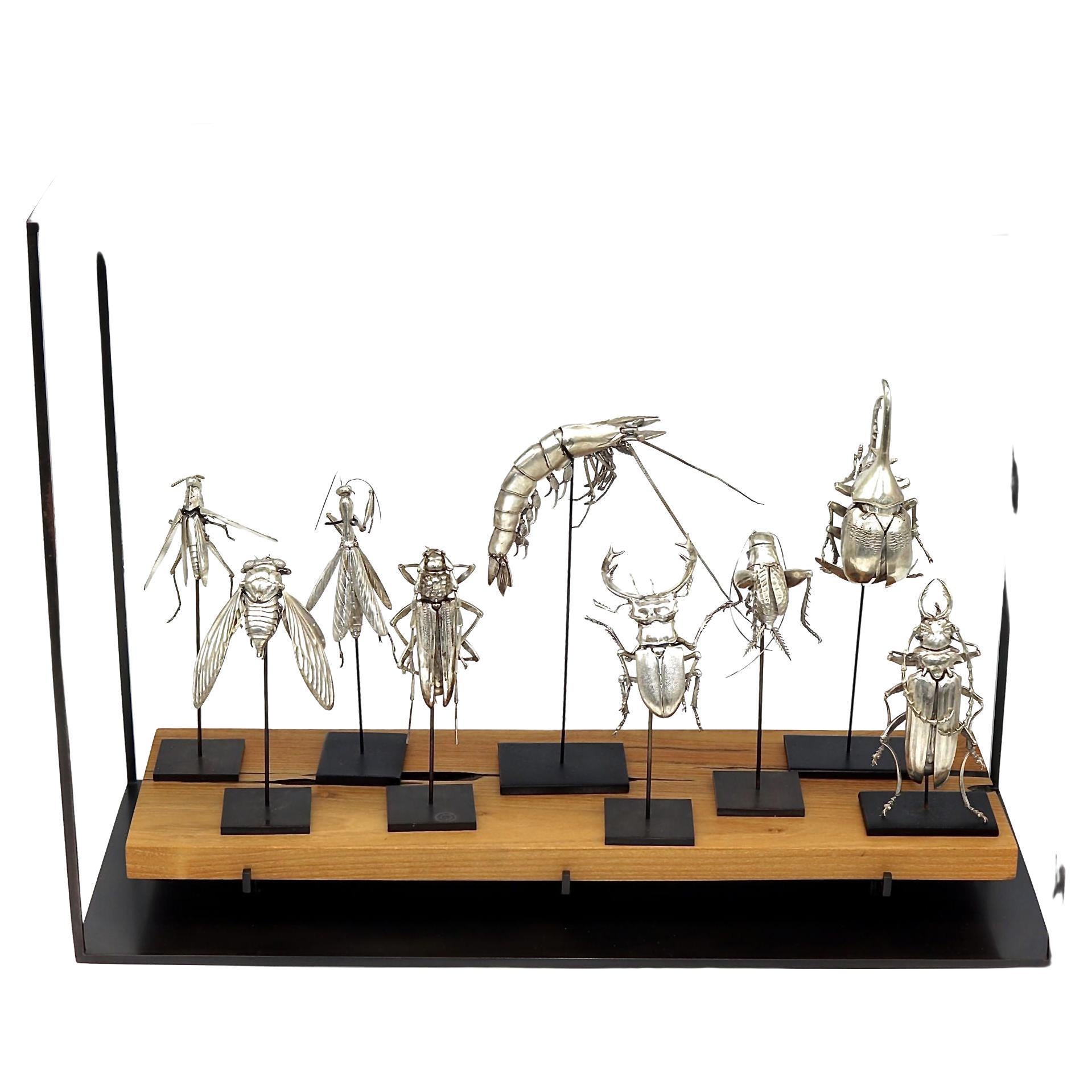 Cast Group of Nine American Silver Articulated Creatures by Oleg Konstantinov