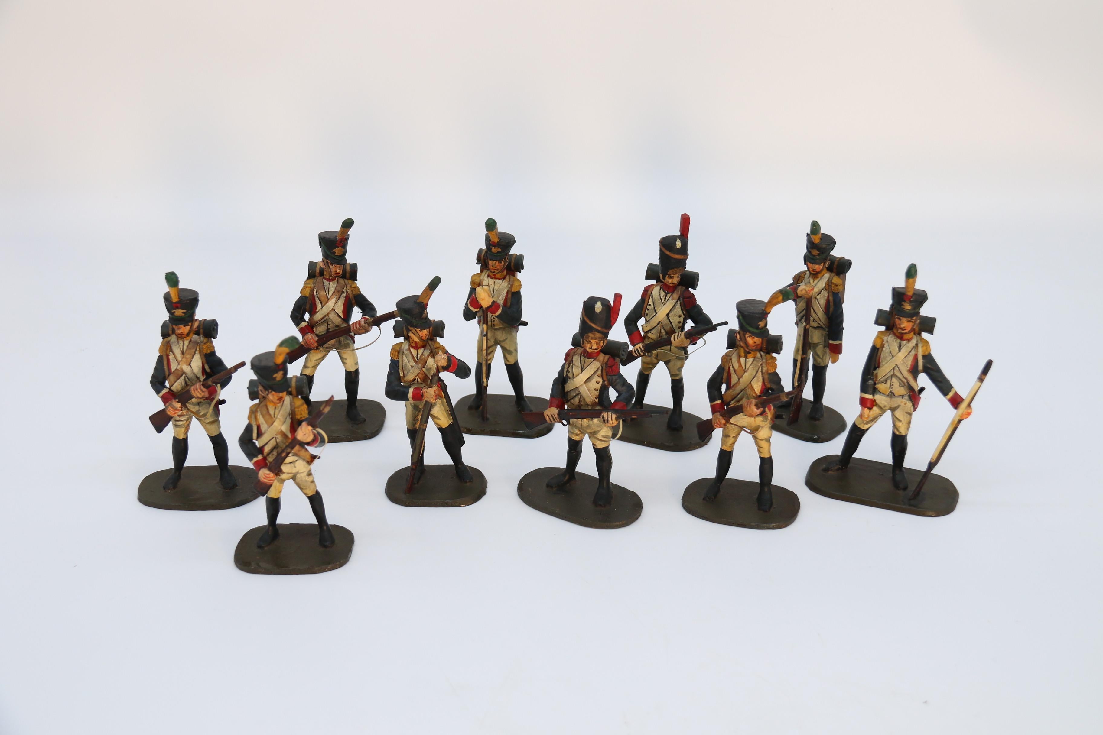 Napoleon III A group of ten hand carved and painted wooden Napoleonic soldier figures c 1930 For Sale