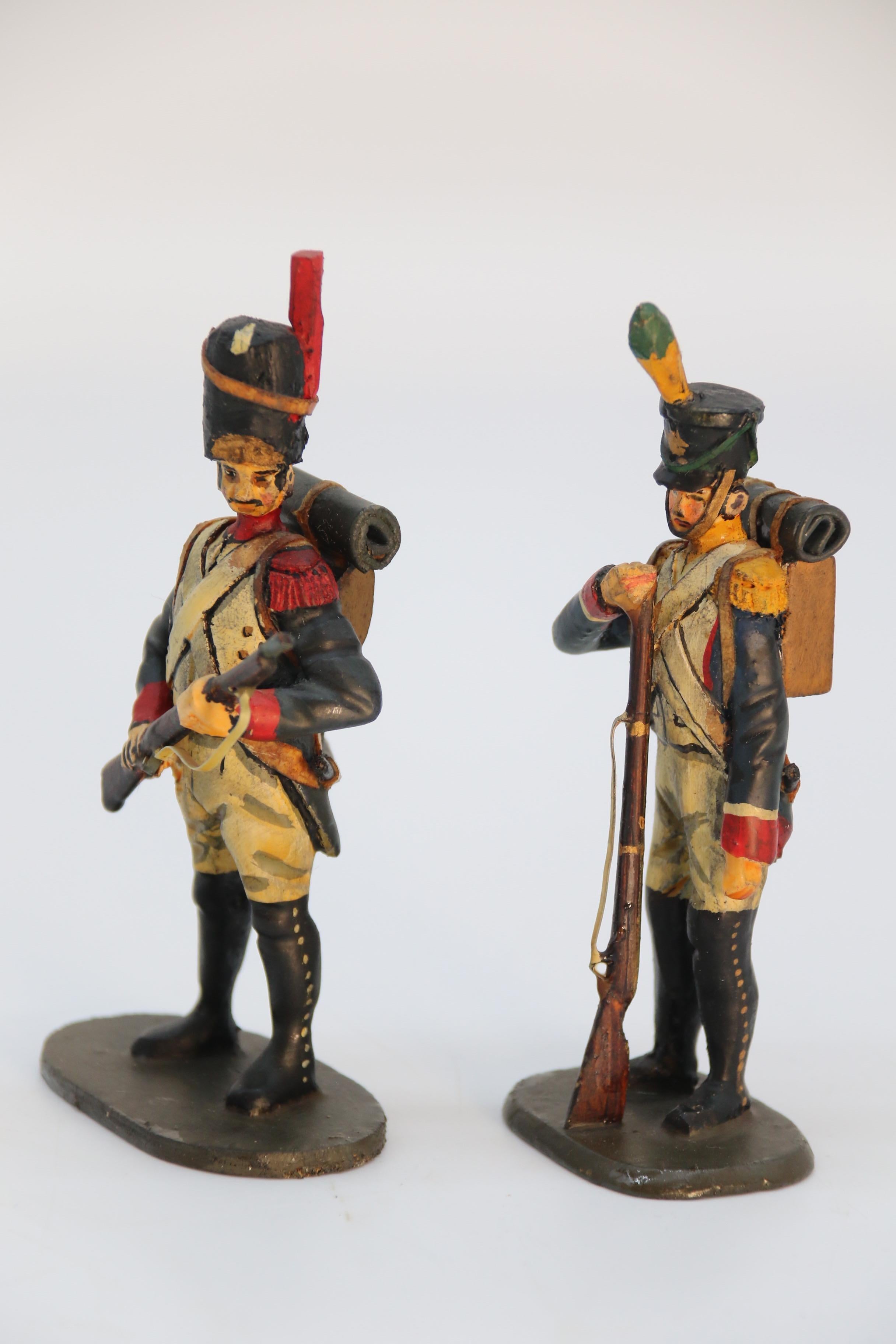 Carved A group of ten hand carved and painted wooden Napoleonic soldier figures c 1930 For Sale