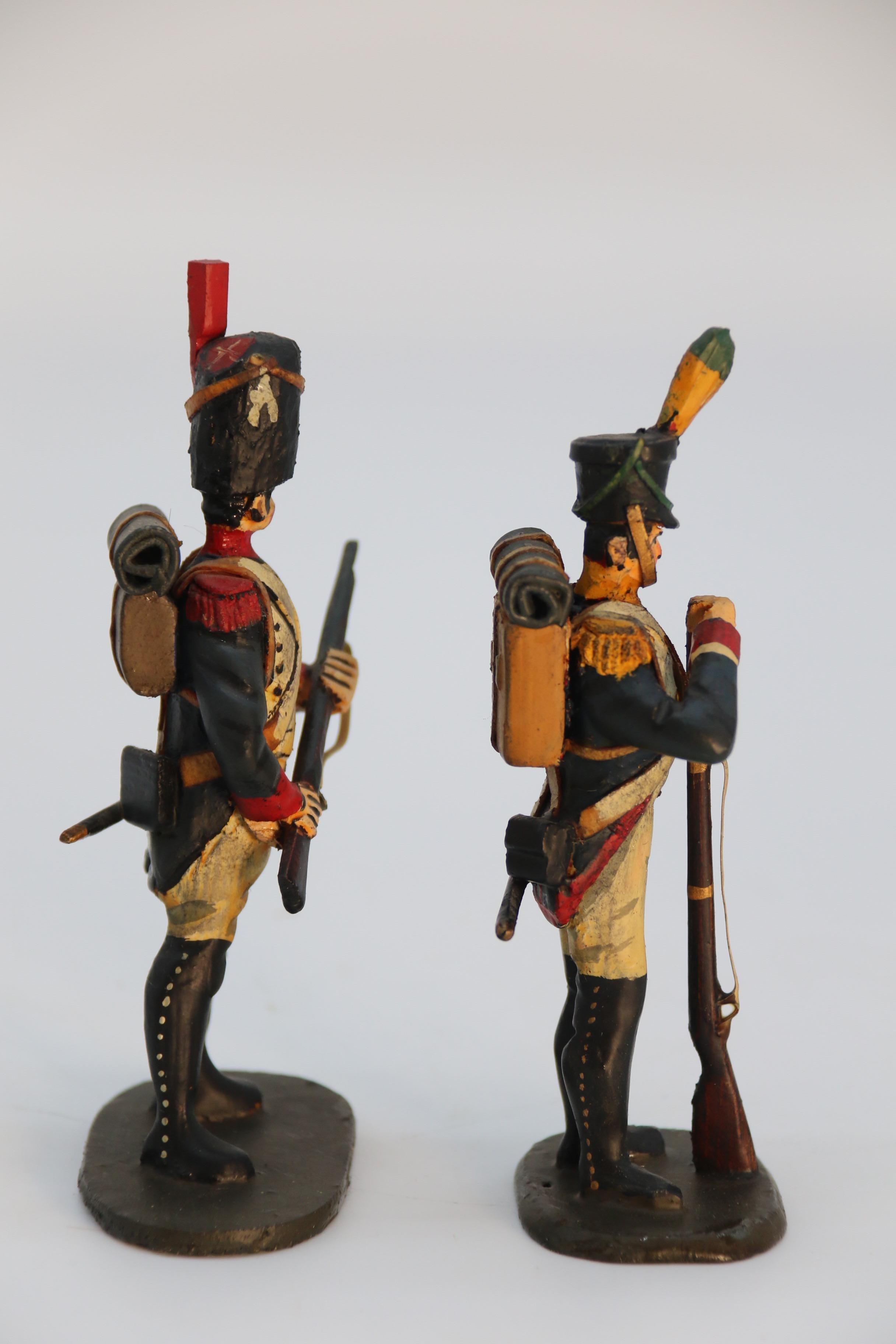 Wood A group of ten hand carved and painted wooden Napoleonic soldier figures c 1930 For Sale