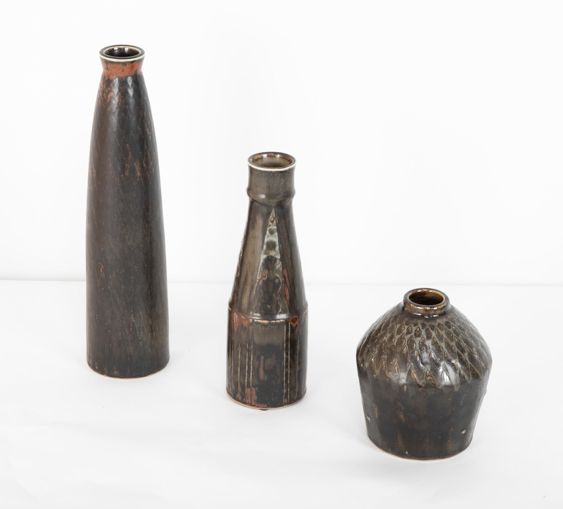 Vases by Carl-Harry Stålhane produced while he worked with Rörstrand. These are part of his Atelje series of works. All three with incensed with the three crowns -R mark of Rorstrand and also signed Atelje CHS Sweden, circa 1955

A Bit about