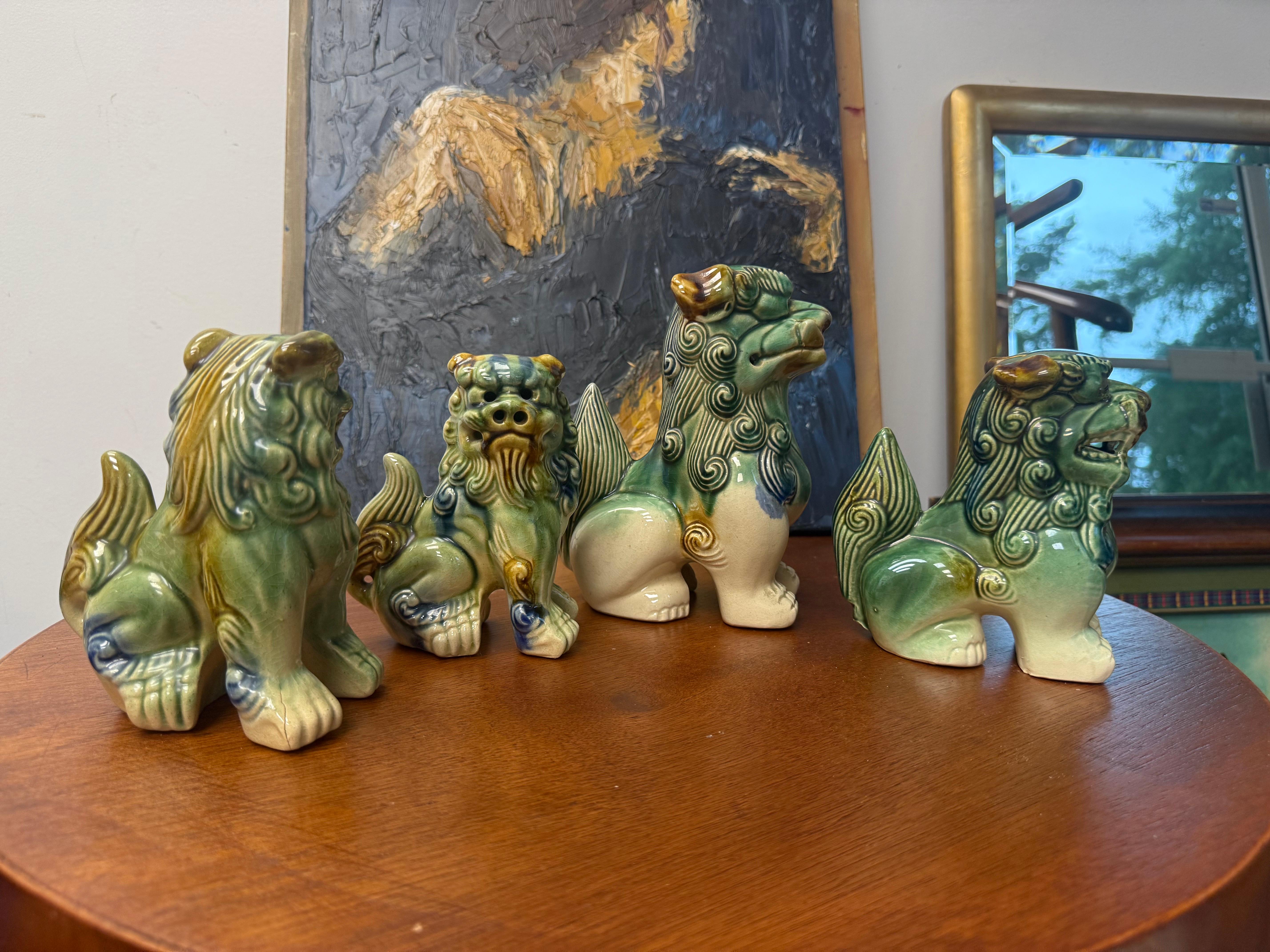 Chinese A Grouping of Mid-Century Ceramic Polychrome Foo Dogs - A Set of 4 For Sale