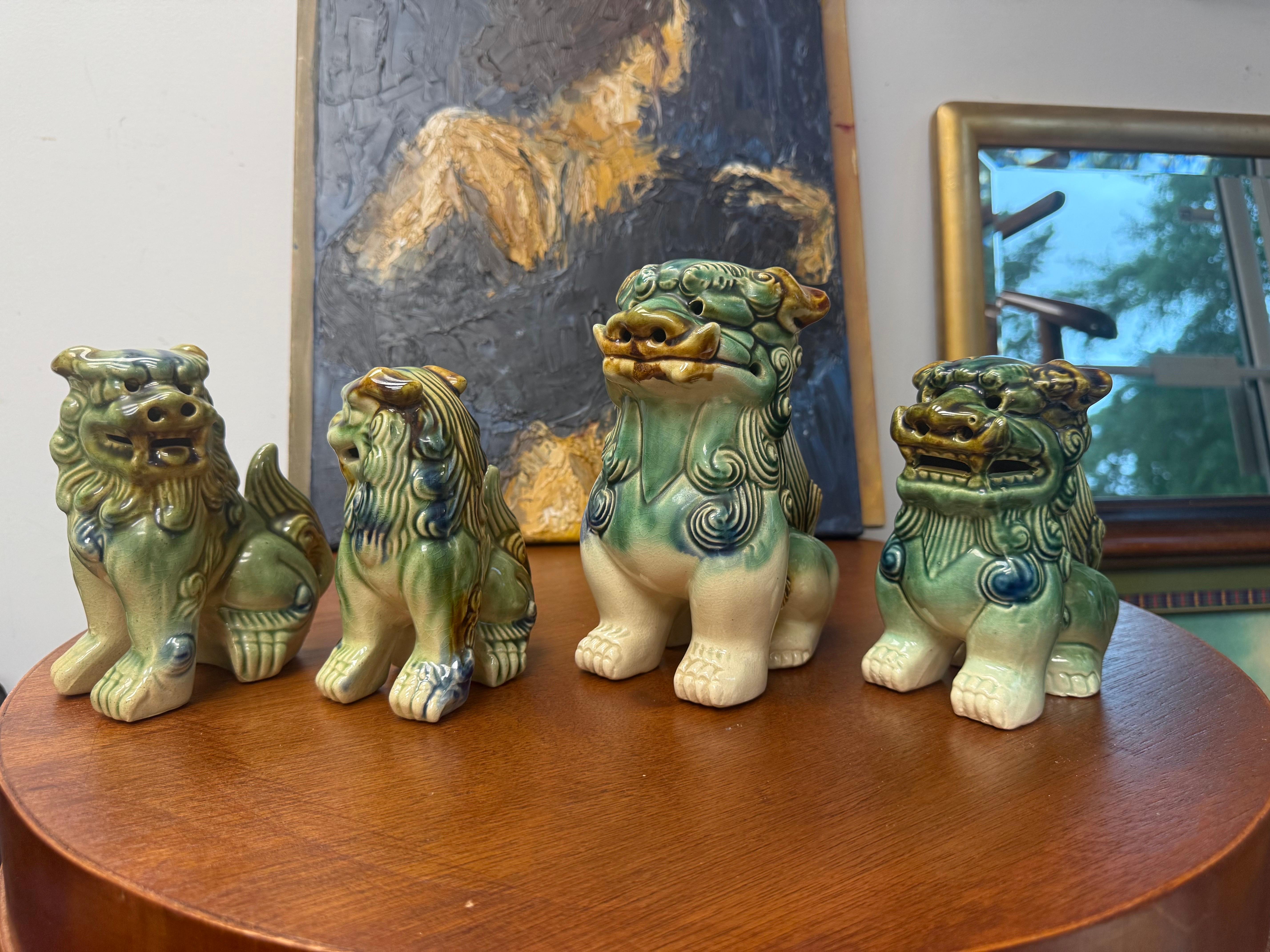 Polychromed A Grouping of Mid-Century Ceramic Polychrome Foo Dogs - A Set of 4 For Sale