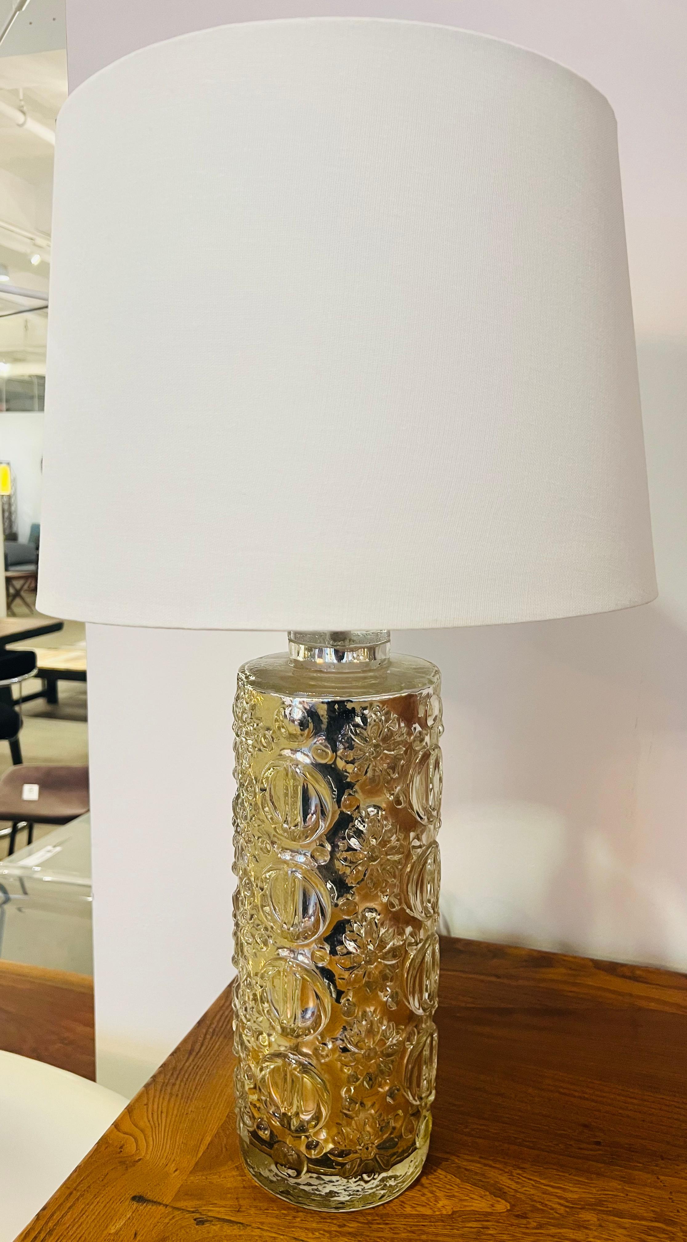 A beautiful silver mercury glass table lamp designed by Gistav Leeks for Orrefors. 1950. Rewired with polished nickel
Double sockets and white cloth cords.