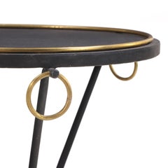 A Gueridon style iron & bronze drinks table.