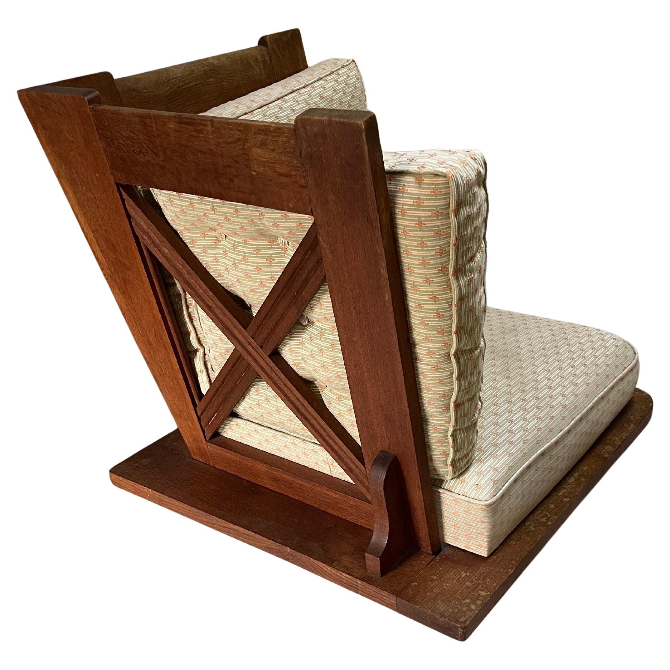 A Guillerme et Chambron oak armchair