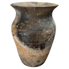A Han Dynasty Dragon-Mask Pottery Vessel