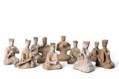 A Han Dynasty Group of Ten Pottery Musician Figures