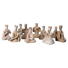 A Han Dynasty Group of Ten Pottery Musician Figures
