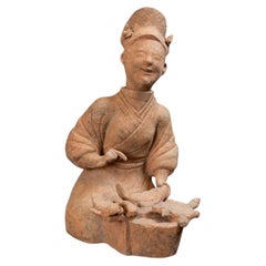 A Han Dynasty Terracotta Figure of a Fish Cook