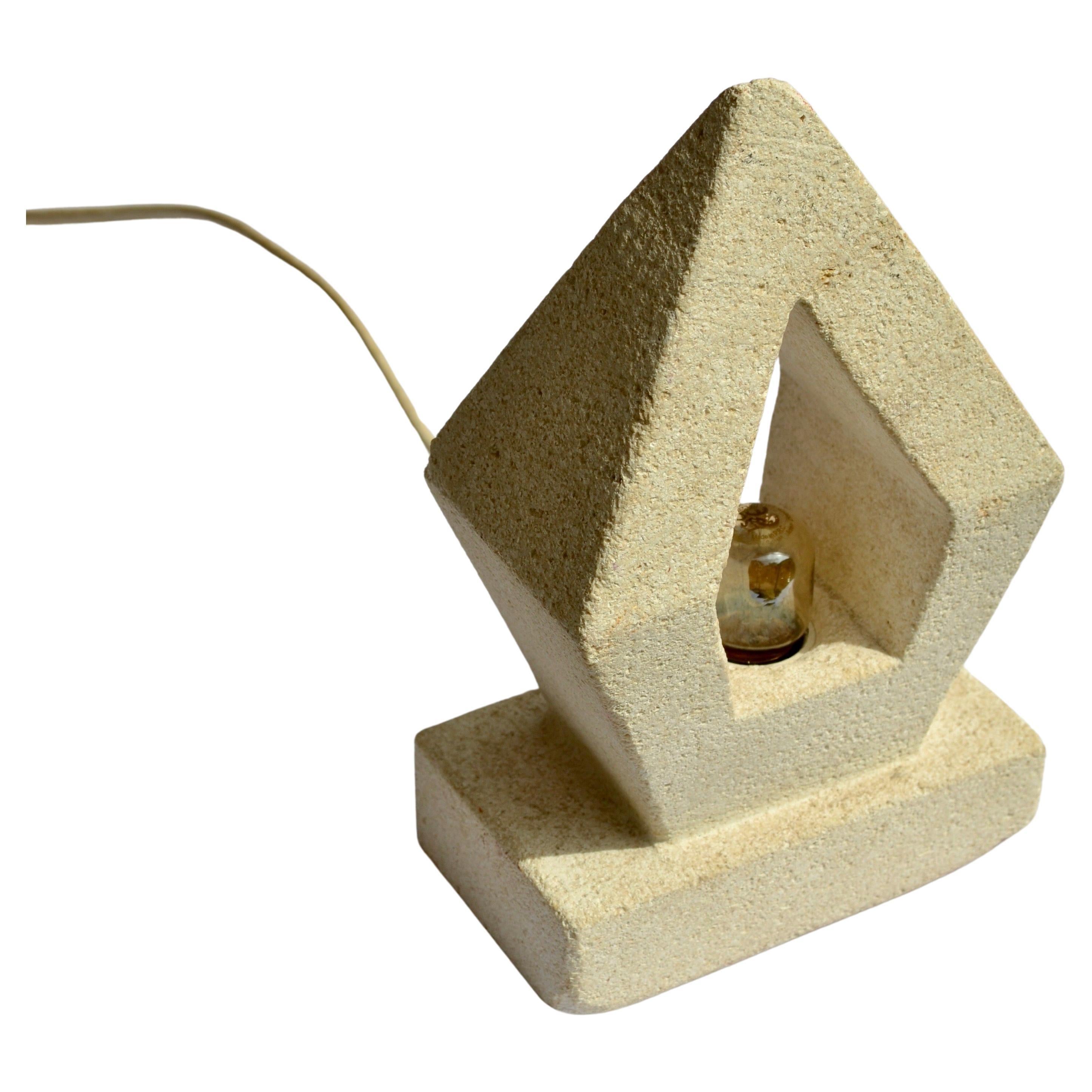 A hand-carved limestone lamp in the shape of a prism - France - 1970s.