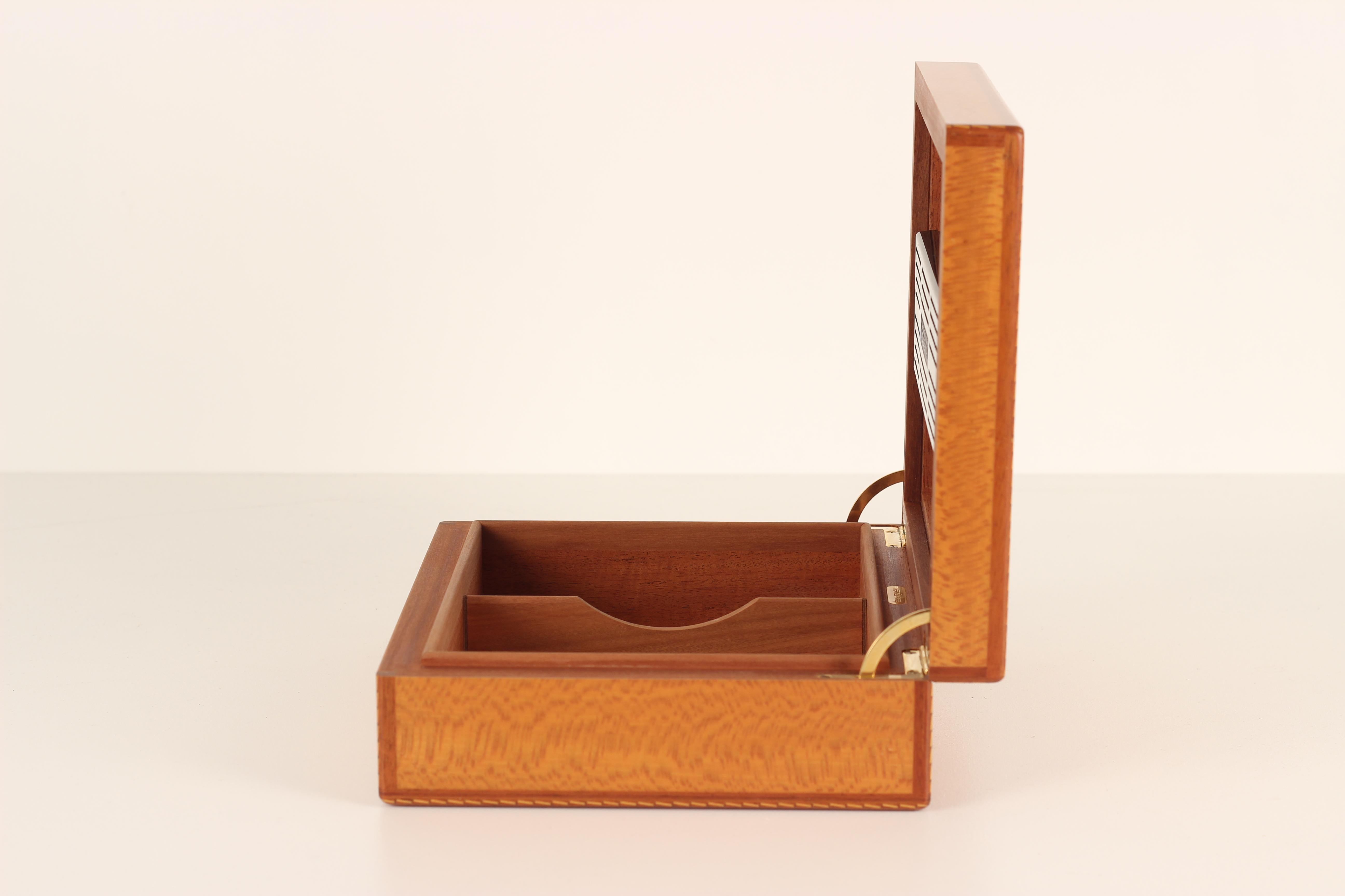 A hand made and crafted Hermes humidor or Cigar Box showing all the expressions, signs of detailing and fine craftsmanship we have come to expect from one of the leaders in understated and classic luxury from the House of Hermès. 

Produced in the
